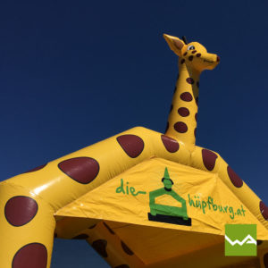 Hüpfburg mieten / Hüpfburg Verleih in der Nähe - Safarihüpfburg Giraffe Vorderansicht